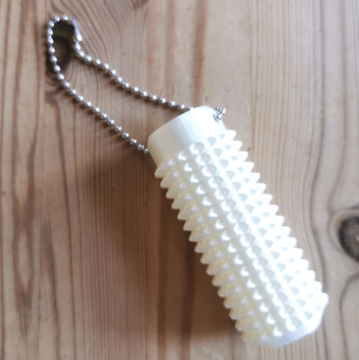 Piikkifidget helmiäisvalkoinen